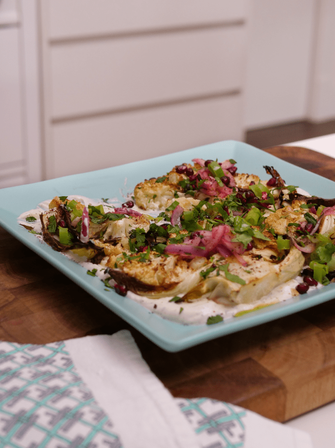 Roasted Cauliflower Steaks with Sumac Yogurt & Herb-Onion Garnish